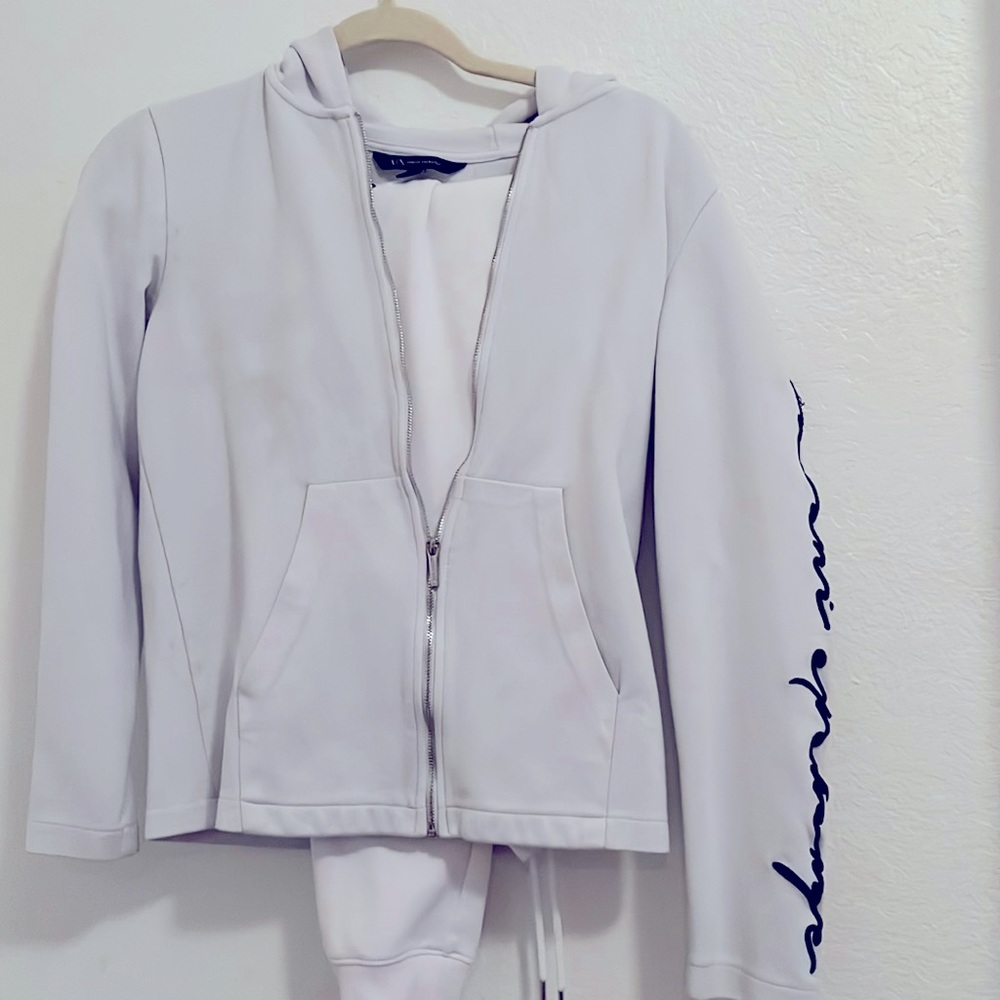 Amani exchange jacket white but js a bit of stains